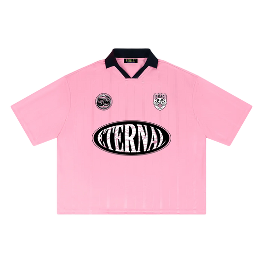 Pink shirt with 'Eterna' logo on a white background
