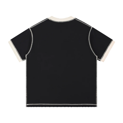 Black t-shirt with white trim on a white background